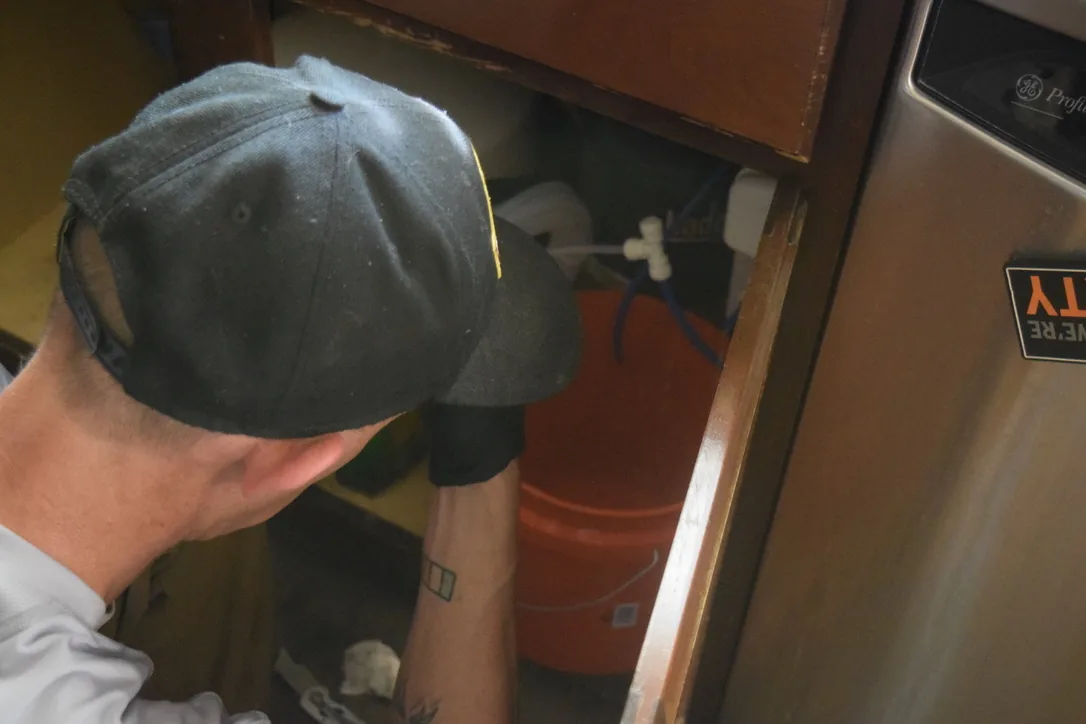 Under-sink plumbing diagnostic and service project
