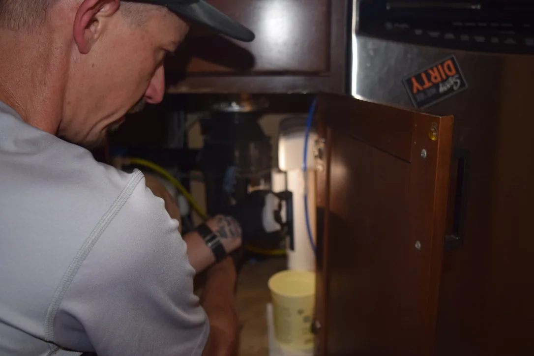 Under-sink plumbing diagnostic and service project