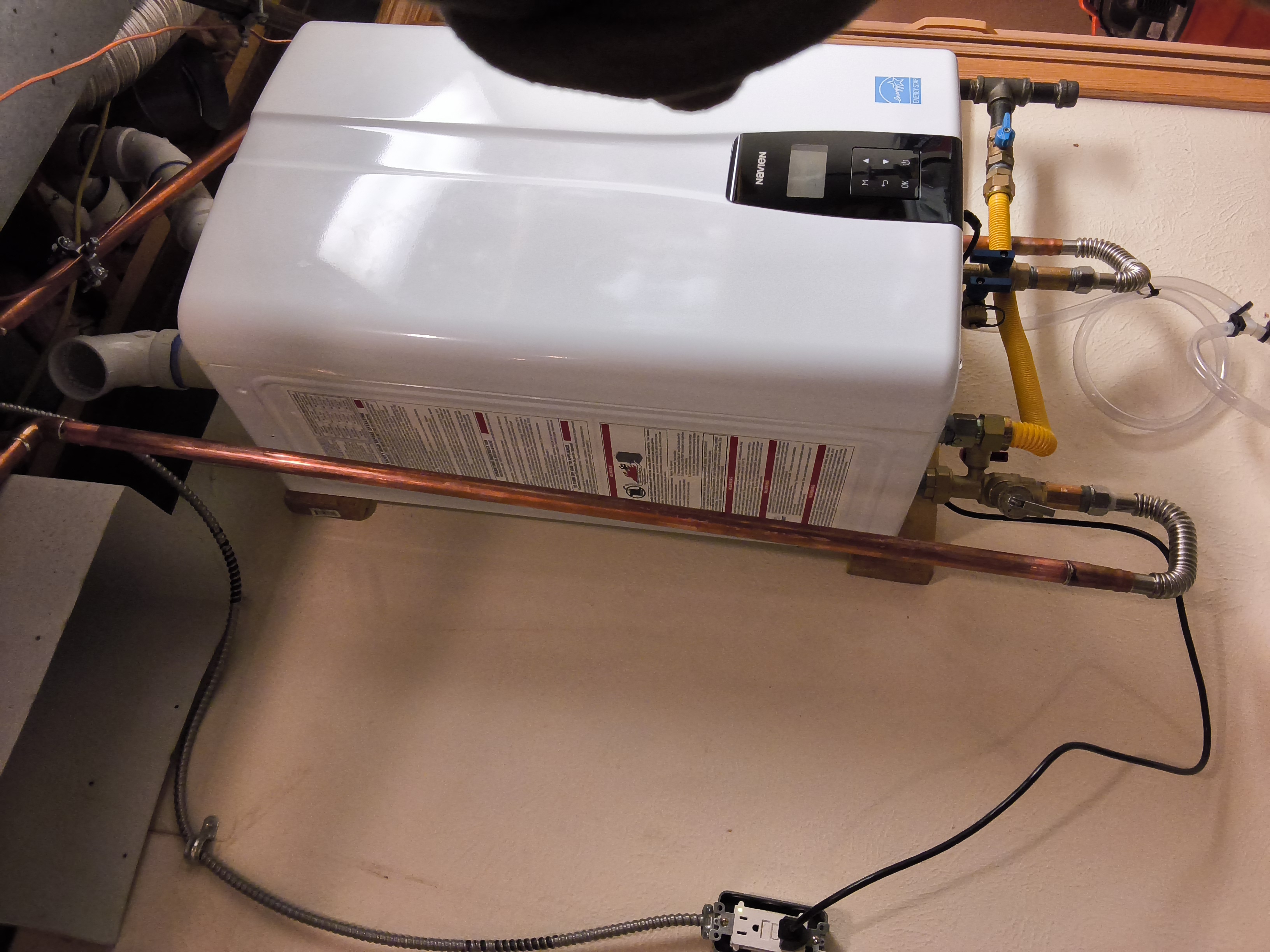 Tankless water heater venting and copper piping detail
