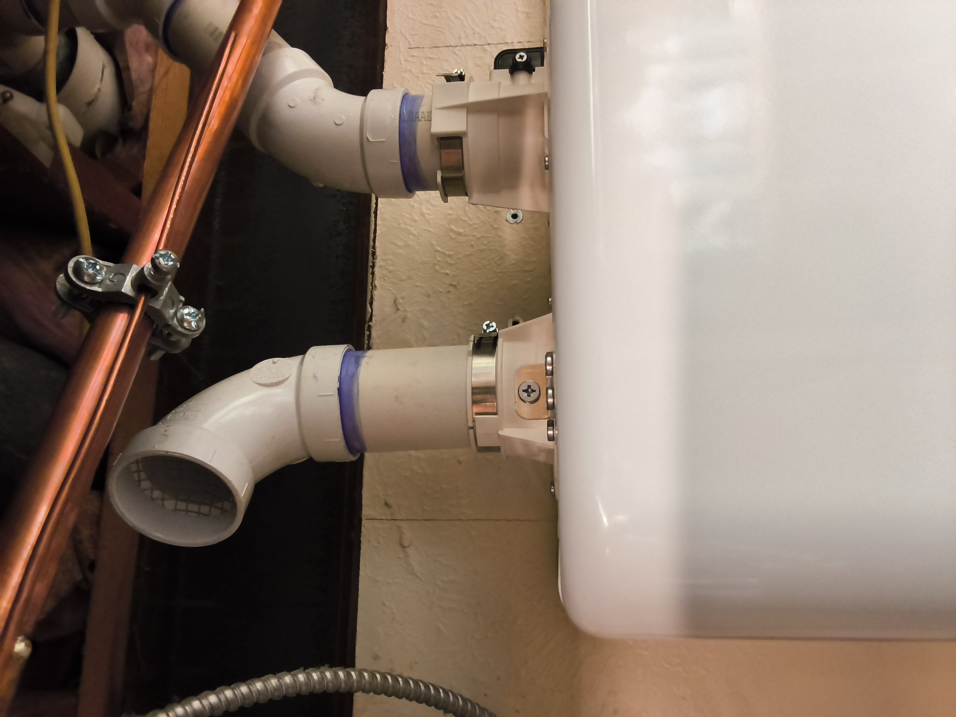 Copper and gas line connections on tankless water heater